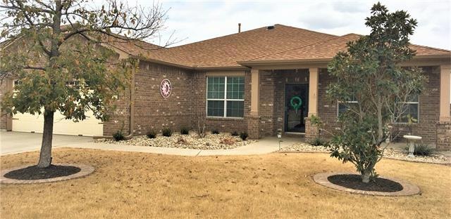 Beautiful one story home in Sun City that sits on a bluff overlooking the golf course.