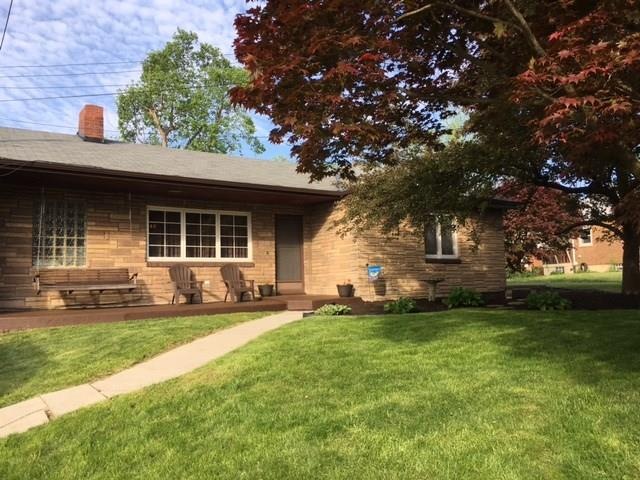 BEAUTIFULLY LANDSCAPED FRONT OF HOME