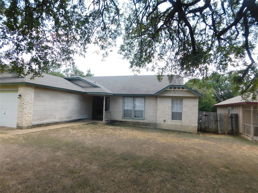 View of front of property featuring an attached garage