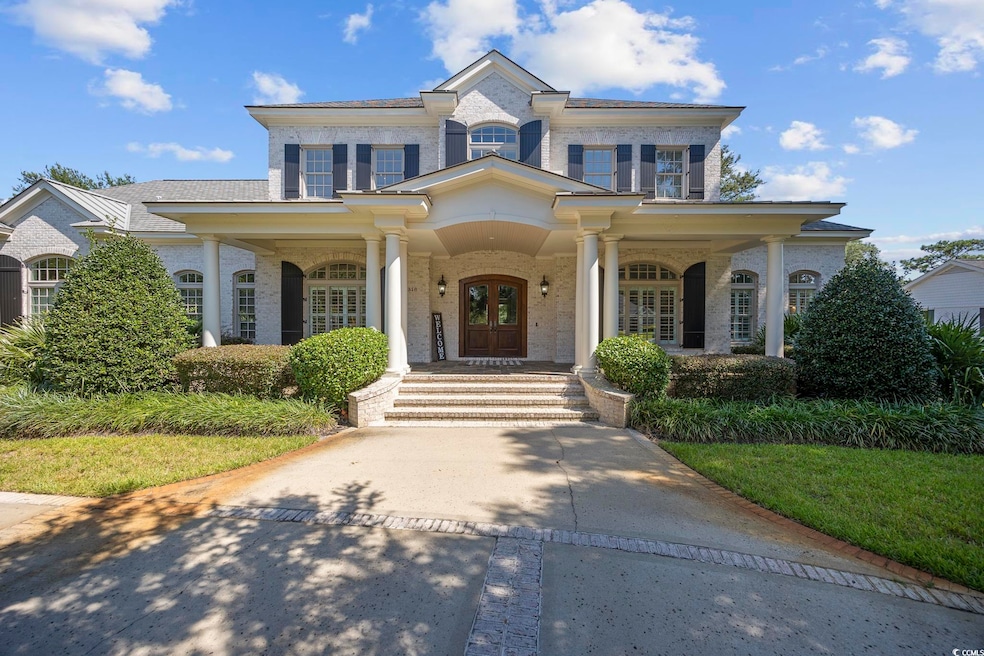 View of front of property featuring covered porch,