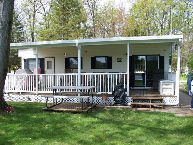 63 Cedar Shores Dr, Hayes Township, MI 48625 - photo 1