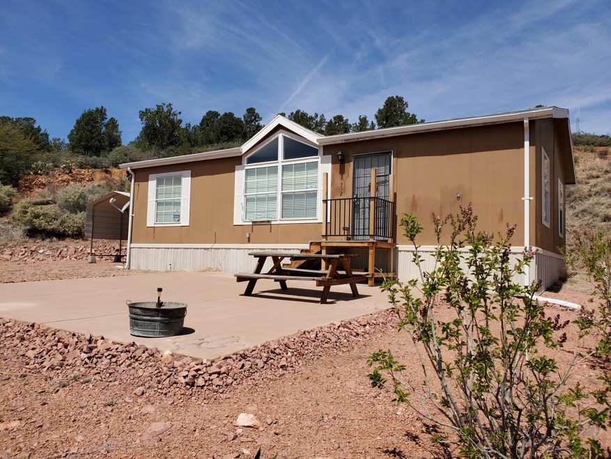 Front w/ Large Concrete Patio