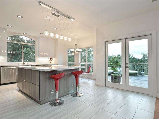 Kitchen to Back Patio - the home has plenty of nat