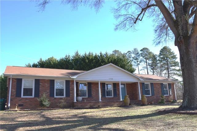 Terrific brick ranch on large, corner lot.