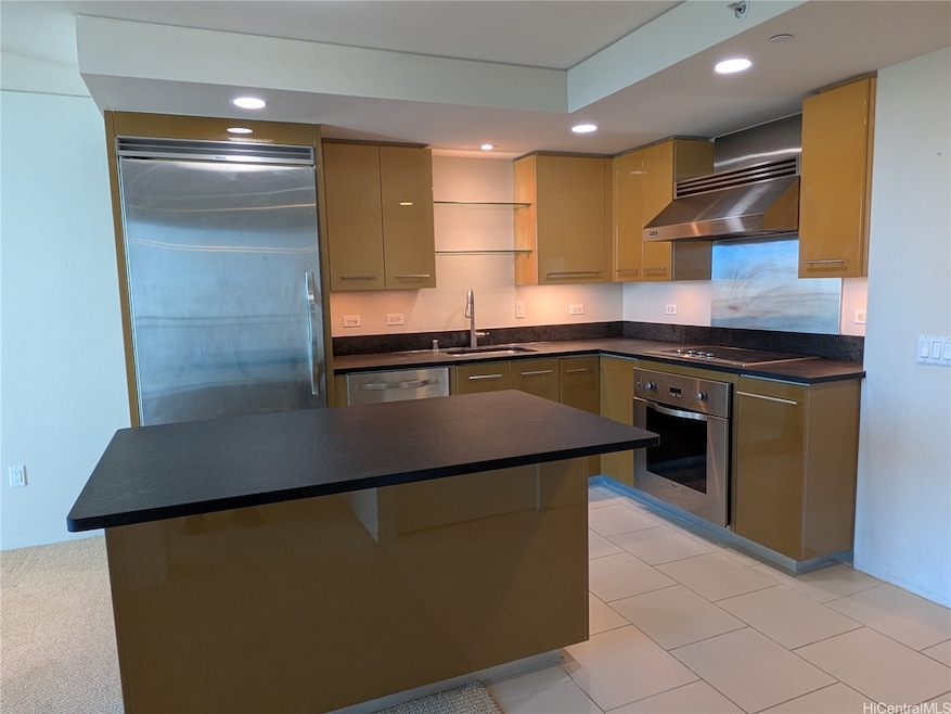The executive style kitchen features stainless steel Viking Appliances and quality cabinets.