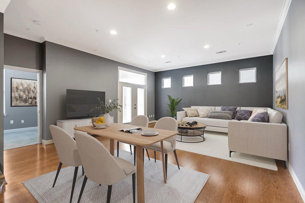 *VIRTUALLY STAGED PHOTO* Spacious living area with a bright open layout perfect for relaxing or entertaining.
