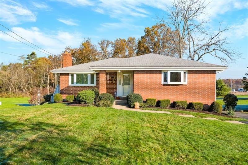 Beautiful brick ranch with covered front porch
