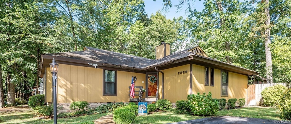 Front Exterior of home with mature landscaping, ou