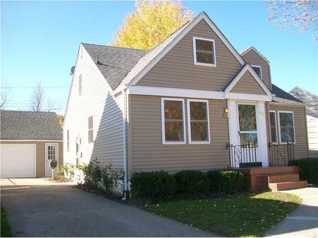 Exterior Front New Siding, windows, roof and front