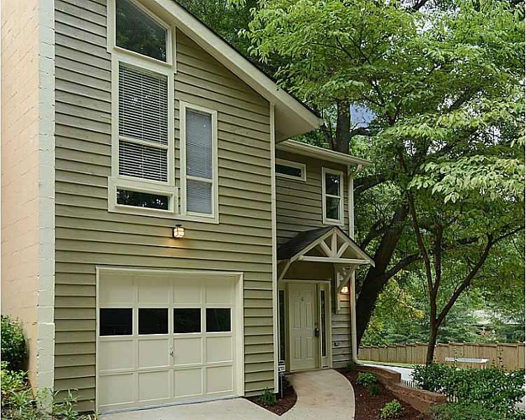 Exterior Front. Beautifully painted, corner unit, 