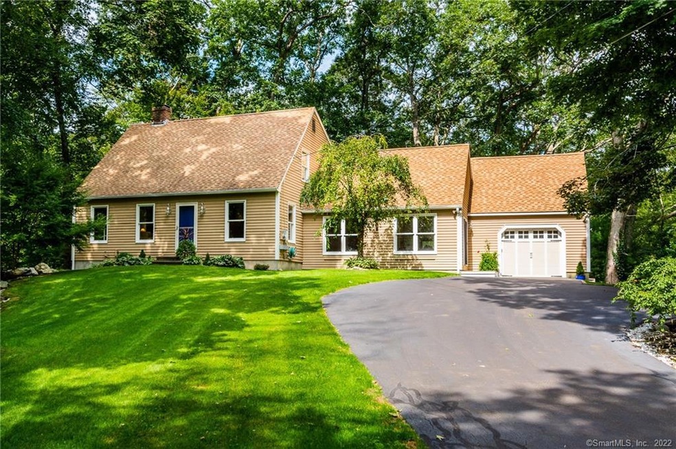 Home sits back on private 1.63 acres which encompa