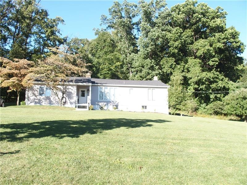 The lot is 1.5 acres and almost totally level, new