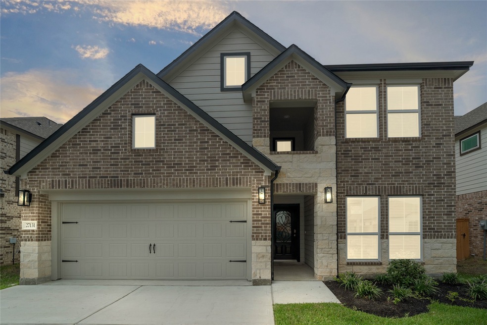 Welcome home to 27131 Peaceful Cove Drive  located in Sunterra and zoned to Katy ISD.