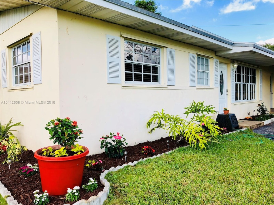 Charming 3/2 single family home with new front yar