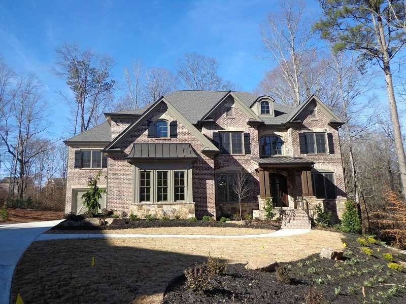 Exterior Front. Private Setting - House sits back 