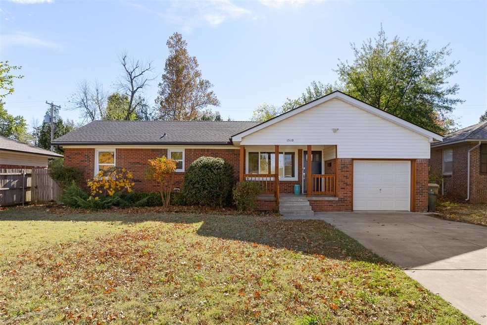 Ranch-style house featuring a front lawn, a porch,