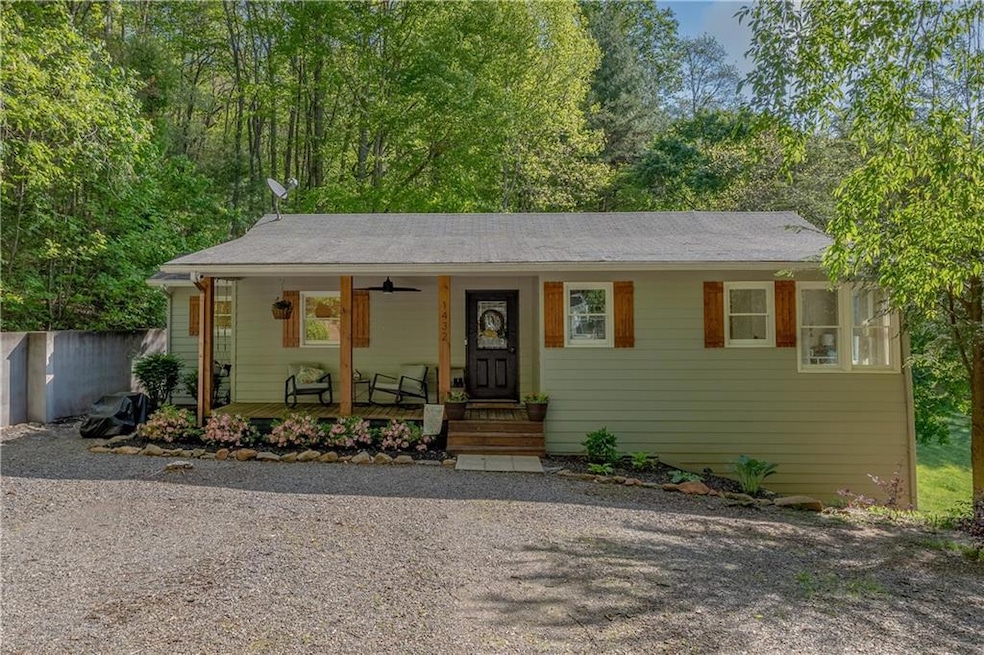 Single story home featuring a porch