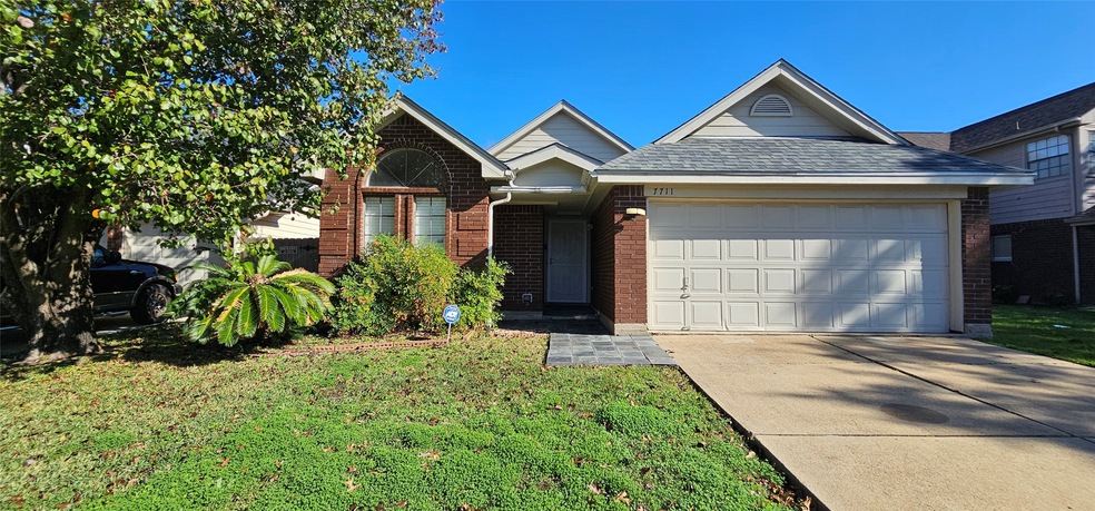 Charming brick home with a well-maintained front y