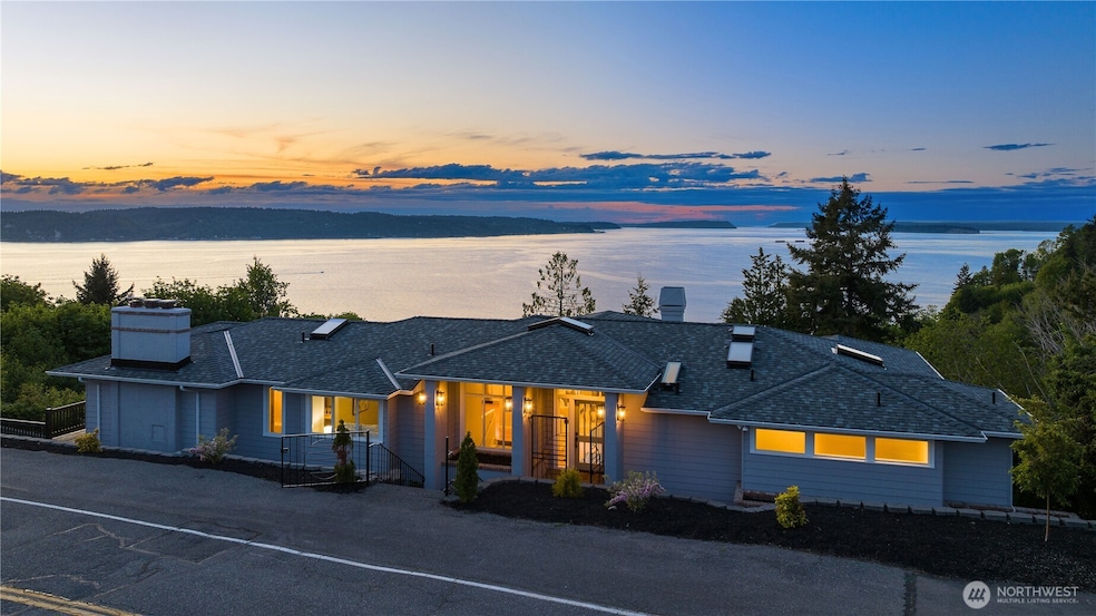 Your dream home with a front-row seat to spectacular Sound views that never get old!