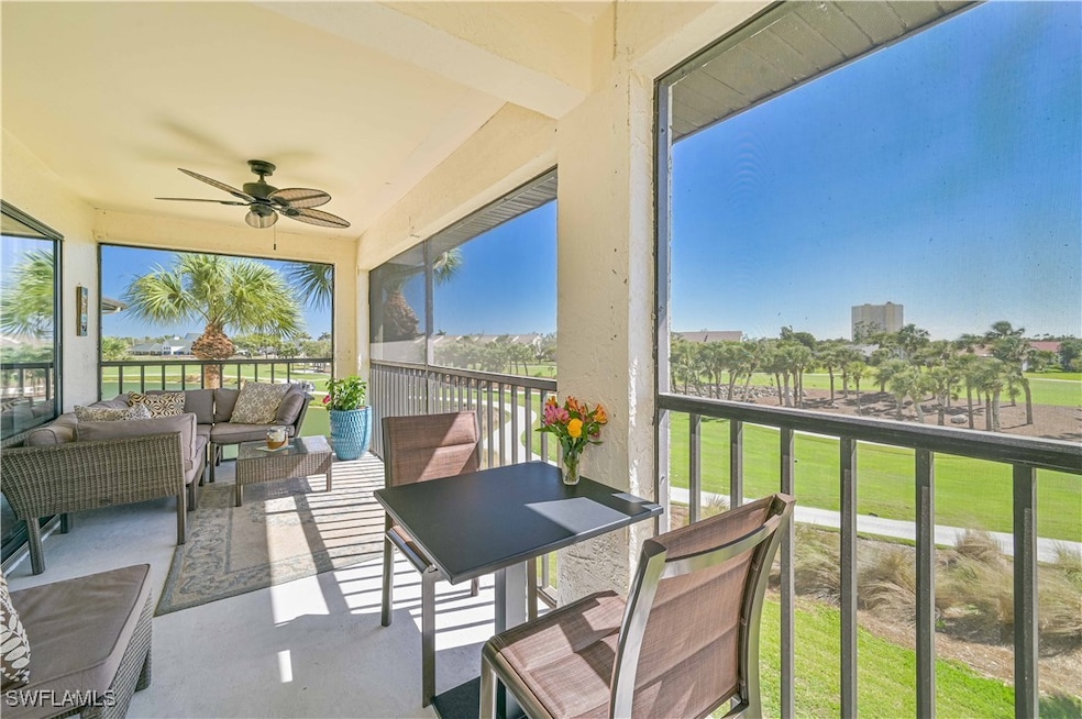 WOW WHAT A VIEW...Sunroom with a ceiling fan