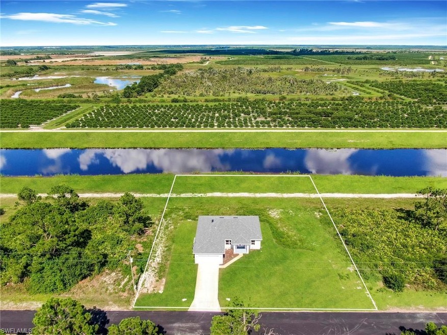 827 Naples Ave S, Lehigh Acres, FL 33974 - photo 1