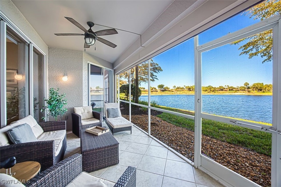 Sunroom featuring an outdoor hangout area, a water