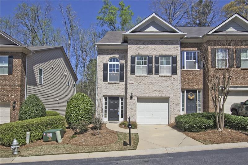 1102 Firethorne Pass is an end unit in the gated c