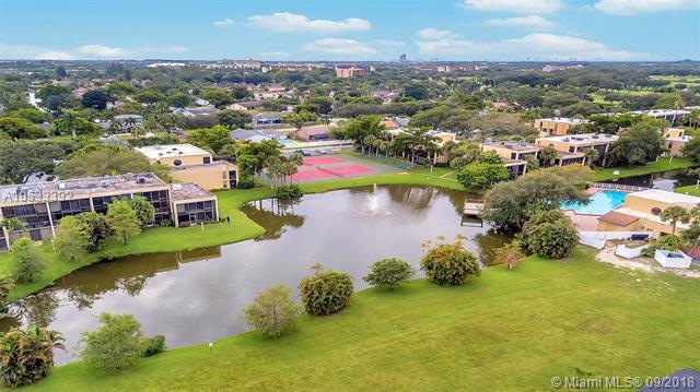 VIEW OF COMPLEX, LAKE, POOL & TENNIS