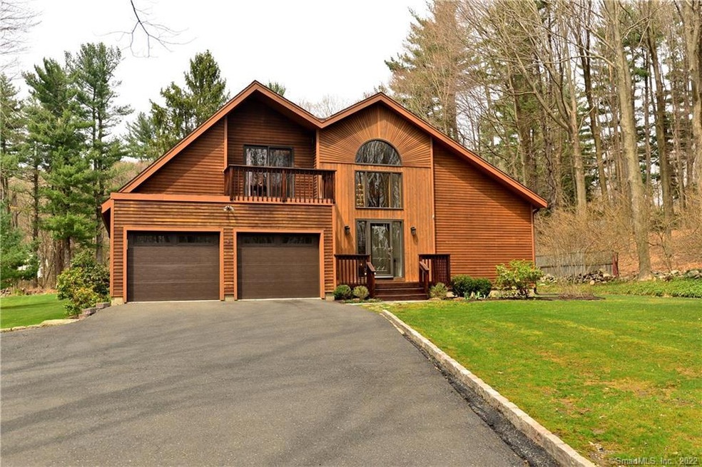 Welcome to this Danbury treasure on almost 2 acres