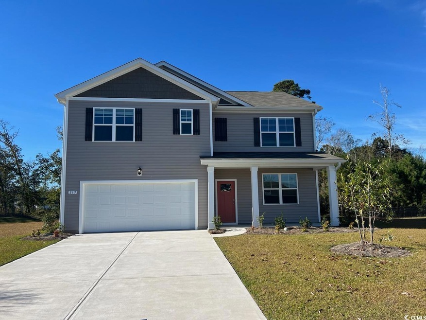View of front of house featuring a front lawn and 