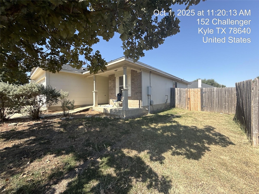 View of side of home with a patio area