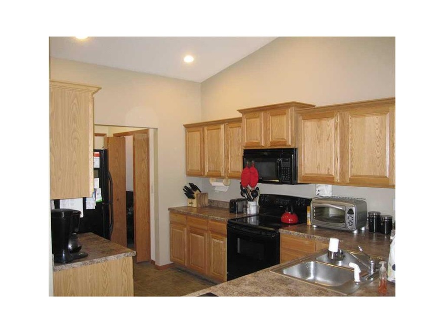 Kitchen. Notice the crown moldings and fresh paint