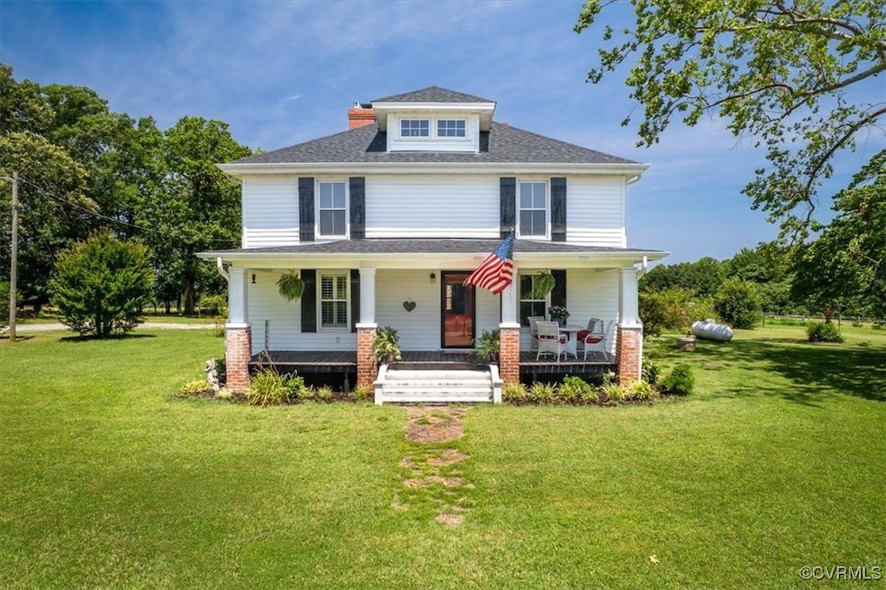 Tucked on 15 Acres this property is horse ready