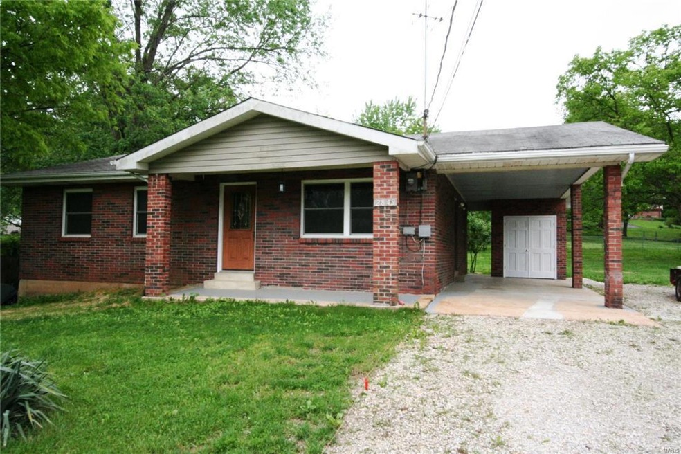 All brick ranch home on almost a half acre level l
