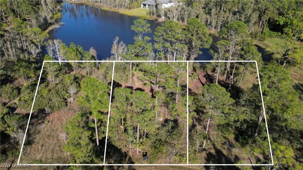Birds eye view of property featuring a water view. Boundary lines are approximate