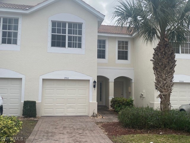 View of front of property with a garage