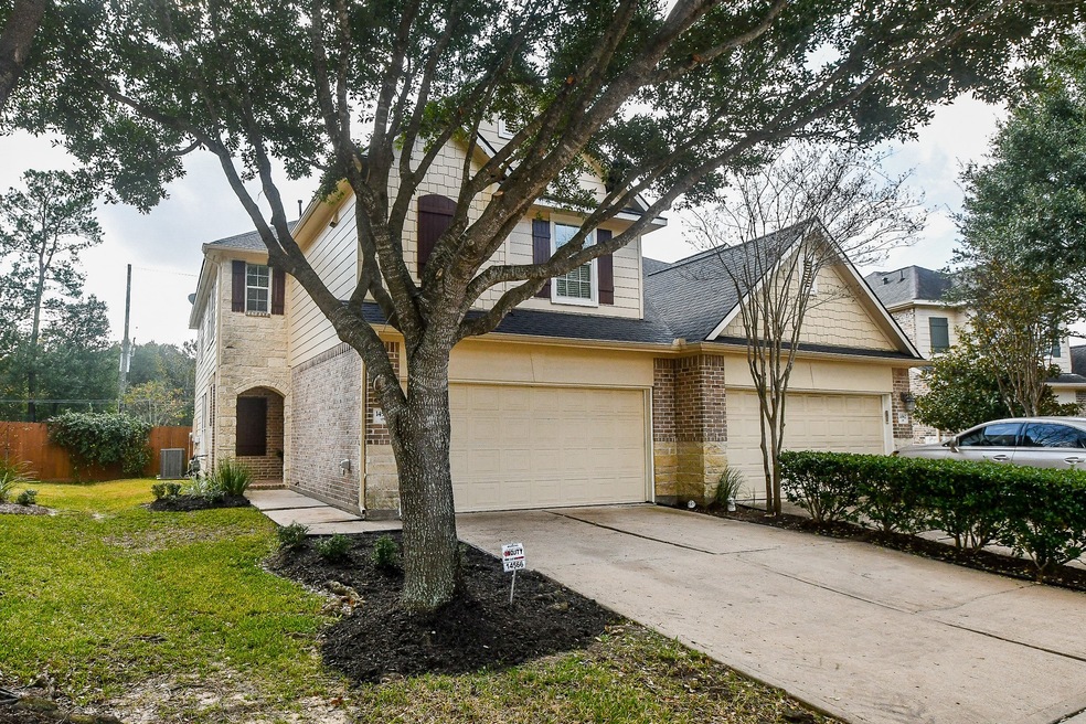 Mature landscaping adds to the beauty of the home.