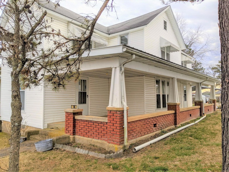 A) Front door and porch