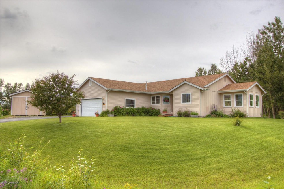 Side yard and front of home