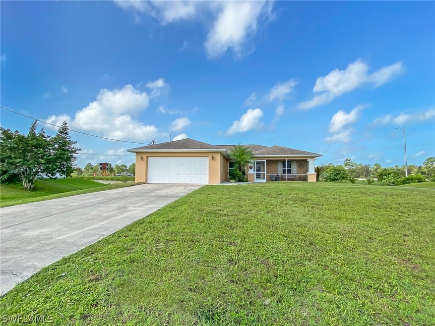 406 Conlee St, Lehigh Acres, FL 33974 - photo 1