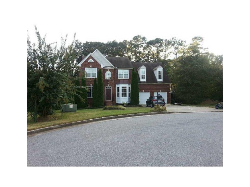 Exterior Front. Brick front two story with full fi