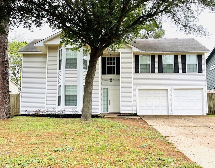 8607 Spruce Mill Dr, Houston, TX 77095 - photo 1