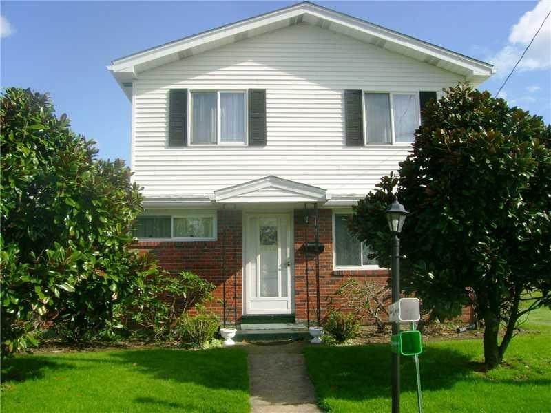 Exterior Front. 2 story brick and vinyl sided home