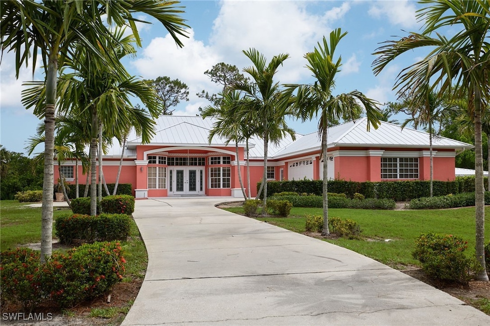 View of building exterior featuring driveway