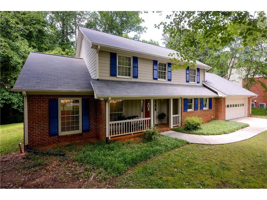 Sweet southern front porch greets your friends & f