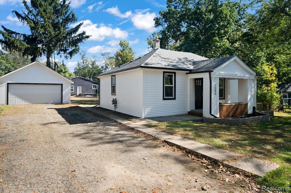 1588 Ladd Rd, Wolverine Lake, MI 48390 - photo 1