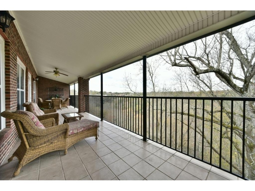 Expansive veranda covers the entire width of the h