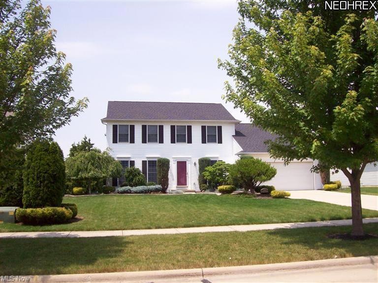 Impeccable landscaping on this 4 Bedroom 2.5 Bath 