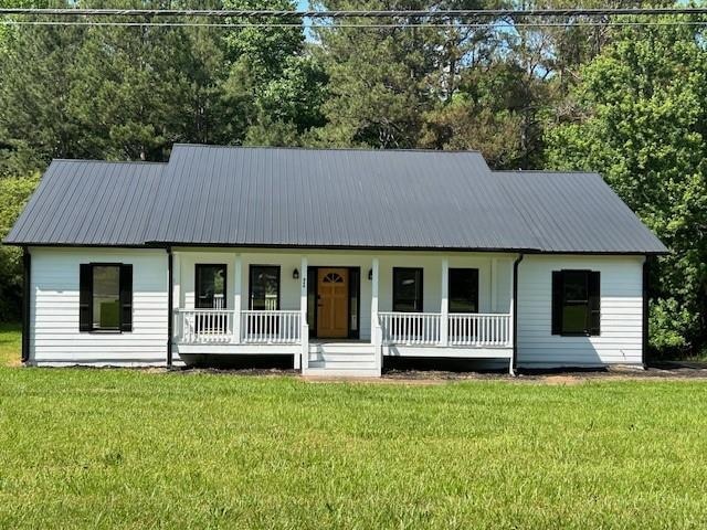 2 Acres 3/2.5 with full daylight basement not fini