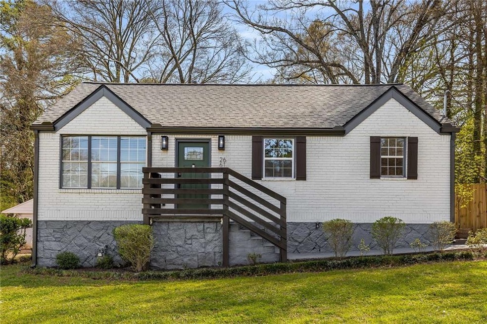 View of front of property featuring a front yard